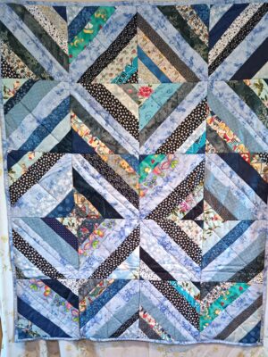 Scrappy Blue Stripped Quilt
