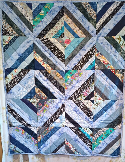 Scrappy Blue Stripped Quilt